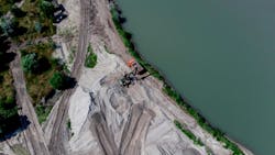 Heavy machinery working near a waterway where it would be beneficial to use a biodegradable hydraulic fluid Heavy machinery working near a waterway where it would be beneficial to use a biodegradable hydraulic fluid