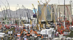 An aerial view of an outdoor exhibition lot at CONEXPO 2023 with various types of construction machines An aerial view of an outdoor exhibition lot at CONEXPO 2023 with various types of construction machines