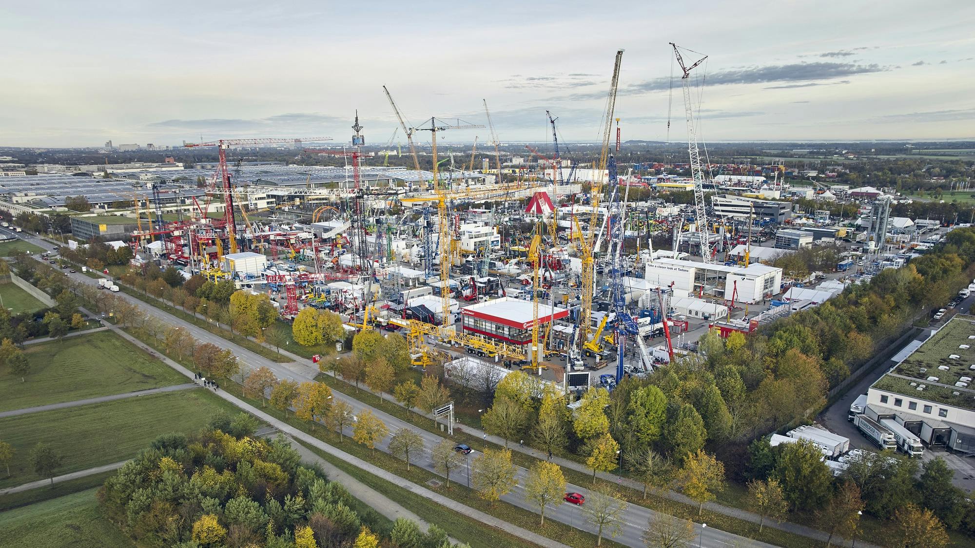 An aerial view of one of the outdoor exhibits at bauma filled with various types of construction and mining machinery