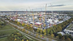 An aerial view of one of the outdoor exhibits at bauma filled with various types of construction and mining machinery An aerial view of one of the outdoor exhibits at bauma filled with various types of construction and mining machinery