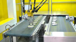 A robot working on a production line A robot working on a production line