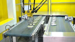A robot working on a production line A robot working on a production line