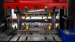 A hydraulic press making rings A hydraulic press making rings