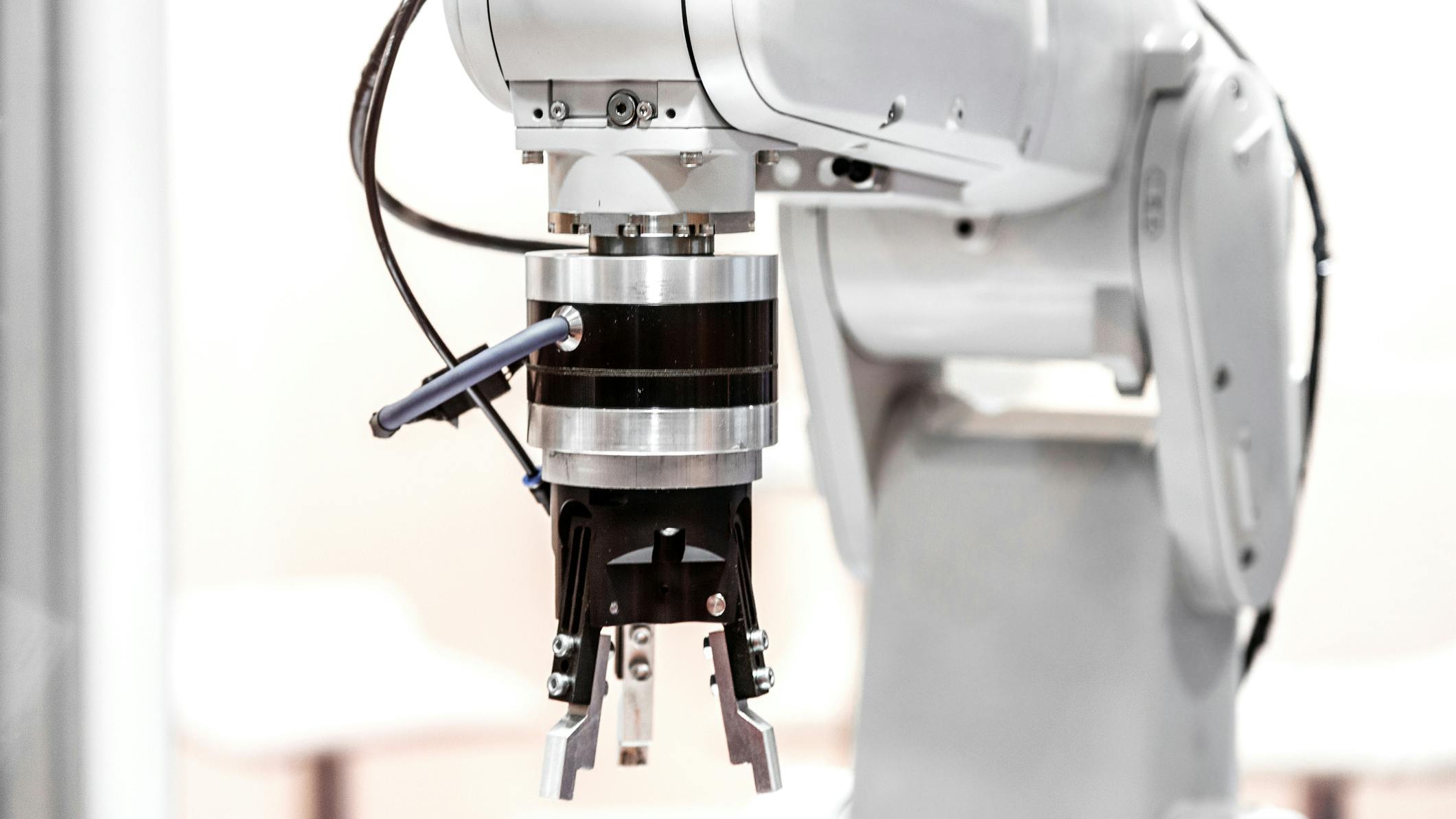 A close up view of an end-of-arm tool on a robot arm