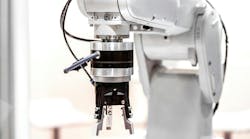 A close up view of an end-of-arm tool on a robot arm A close up view of an end-of-arm tool on a robot arm