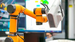 A cobot scanning a product A cobot scanning a product