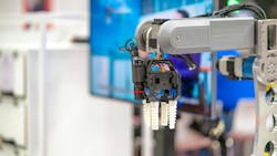 A close up view of a vision system and electric gripper on a collaborative robot A close up view of a vision system and electric gripper on a collaborative robot