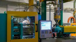 An injection molding machine which uses various types of motion system components An injection molding machine which uses various types of motion system components