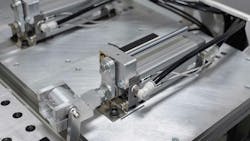 A pneumatic cylinder installed on an industrial machine A pneumatic cylinder installed on an industrial machine
