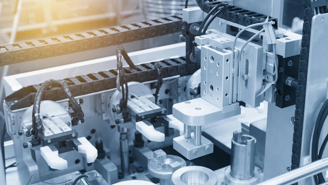 A close up view of pneumatic components in an industrial machine