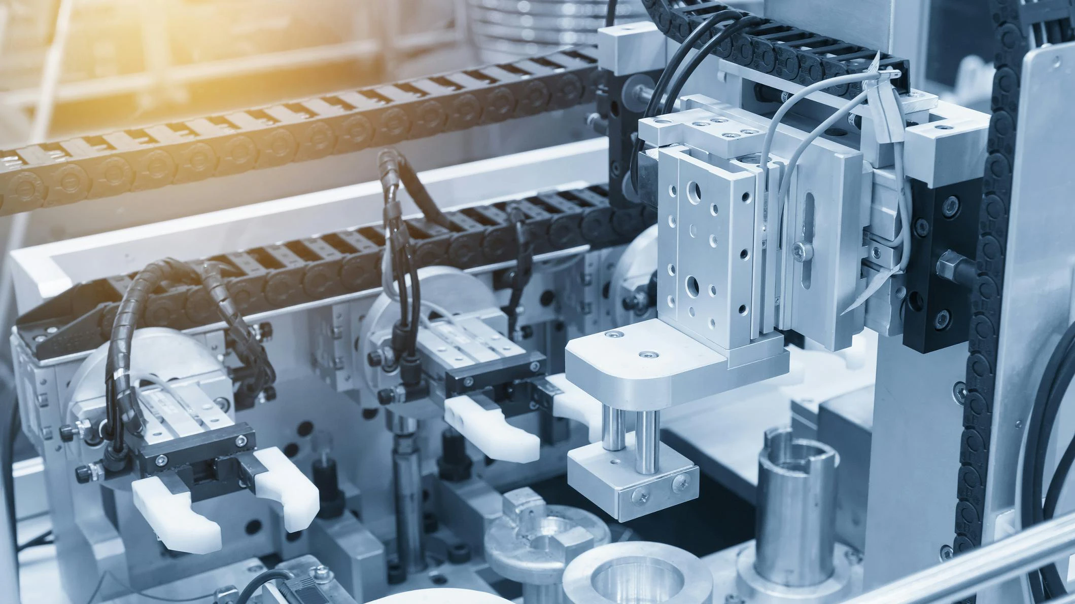 A close up view of pneumatic components in an industrial machine