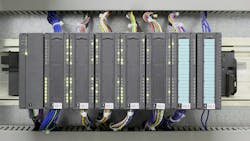 A PLC and other networking componentry in an industrial setting A PLC and other networking componentry in an industrial setting