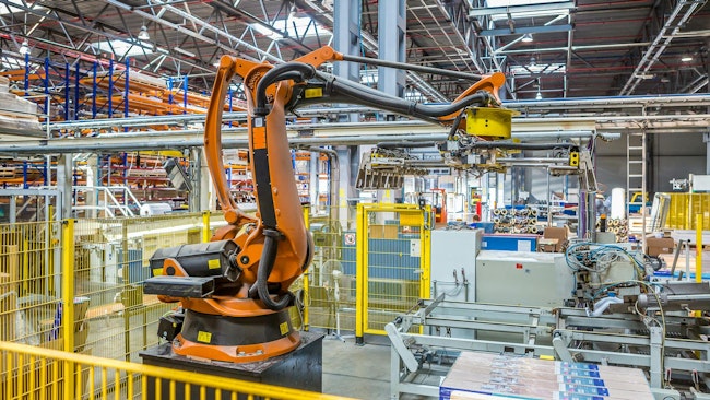 An industrial robot working in a production facility