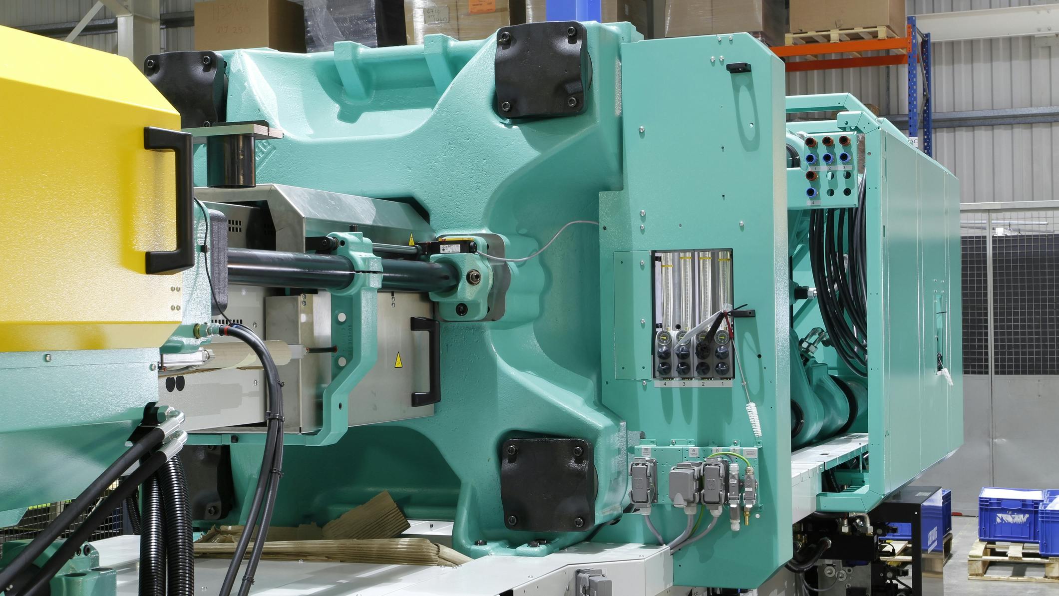 A close up view of an injection molding machine