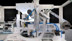 Packaging machinery with pneumatic and other components showing Packaging machinery with pneumatic and other components showing