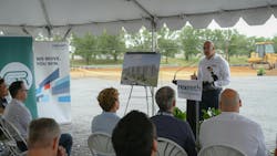 A Bosch Rexroth executive speaks to attendees at warehouse expansion groundbreaking ceremony A Bosch Rexroth executive speaks to attendees at warehouse expansion groundbreaking ceremony