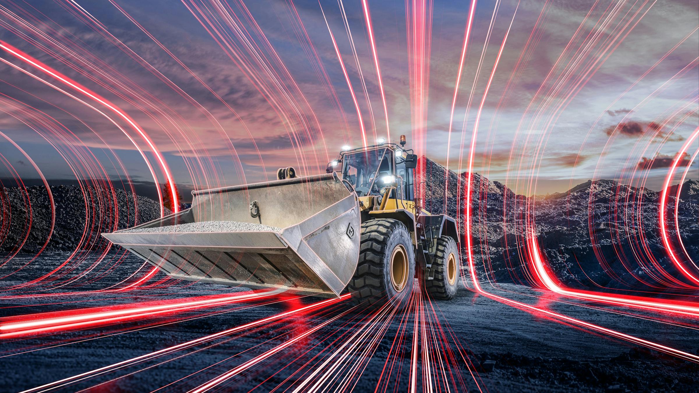 A wheel loader with red lines coming out of it to illustrate electrification