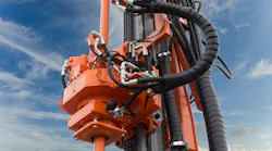 Close up view of hydraulic components on drilling machine