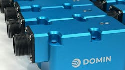 Several Domin hydraulic servo valves lined up next to each other Several Domin hydraulic servo valves lined up next to each other