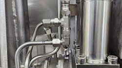 Close up of hydraulic components part of a custom system design for a hydraulic elevator Close up of hydraulic components part of a custom system design for a hydraulic elevator