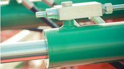 Close up on hydraulic and pneumatic components Close up on hydraulic and pneumatic components