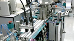 Pneumatic and other components on an industrial machine setup Pneumatic and other components on an industrial machine setup