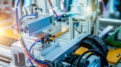 Industrial machine setup with pneumatics and other components visible Industrial machine setup with pneumatics and other components visible