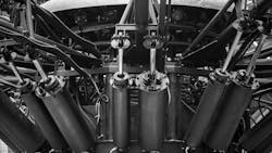 Underside view of several hydraulic cylinders installed on a machine Underside view of several hydraulic cylinders installed on a machine