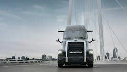The Mack Pioneer truck driving on a roadway The Mack Pioneer truck driving on a roadway