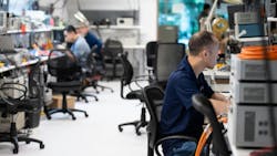 Employees working in a Delta-Q Testing Laboratory Employees working in a Delta-Q Testing Laboratory