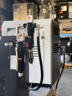 Close up view on dryer and filter for a compressed air system Close up view on dryer and filter for a compressed air system