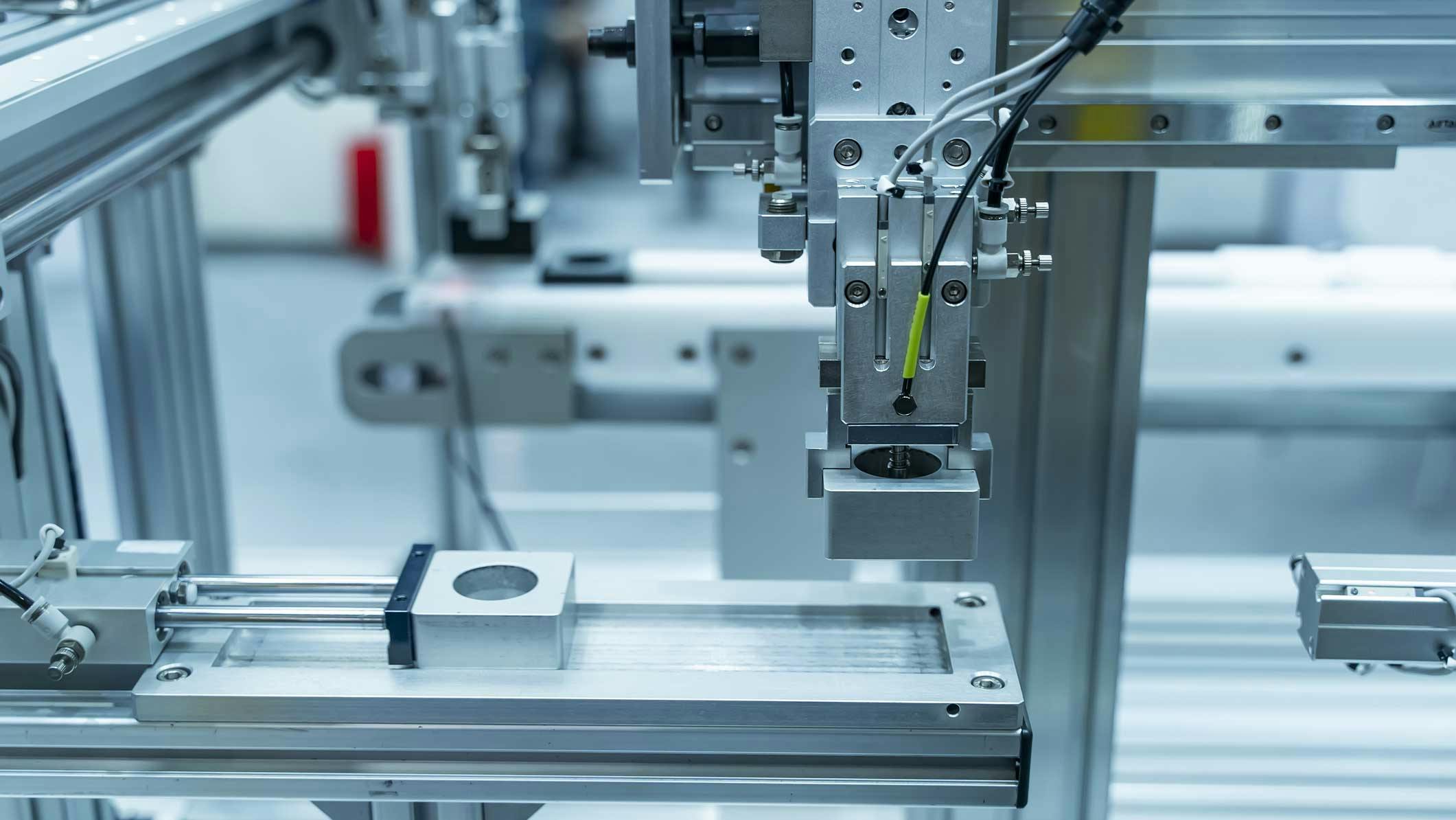 Pneumatic components and gripper on a robotic machine setup