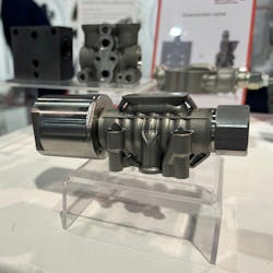 A 3D printed hydraulic component on display at CONEXPO A 3D printed hydraulic component on display at CONEXPO