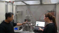 Bipin Kashid (left) and intern turned employee Jenna Watts (right) working on a Parker Hannifin test stand Bipin Kashid (left) and intern turned employee Jenna Watts (right) working on a Parker Hannifin test stand