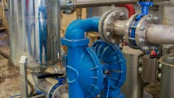 Diaphragm pump installed in an industrial facility Diaphragm pump installed in an industrial facility