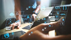 Icons depicting digital technologies superimposed over computers Icons depicting digital technologies superimposed over computers