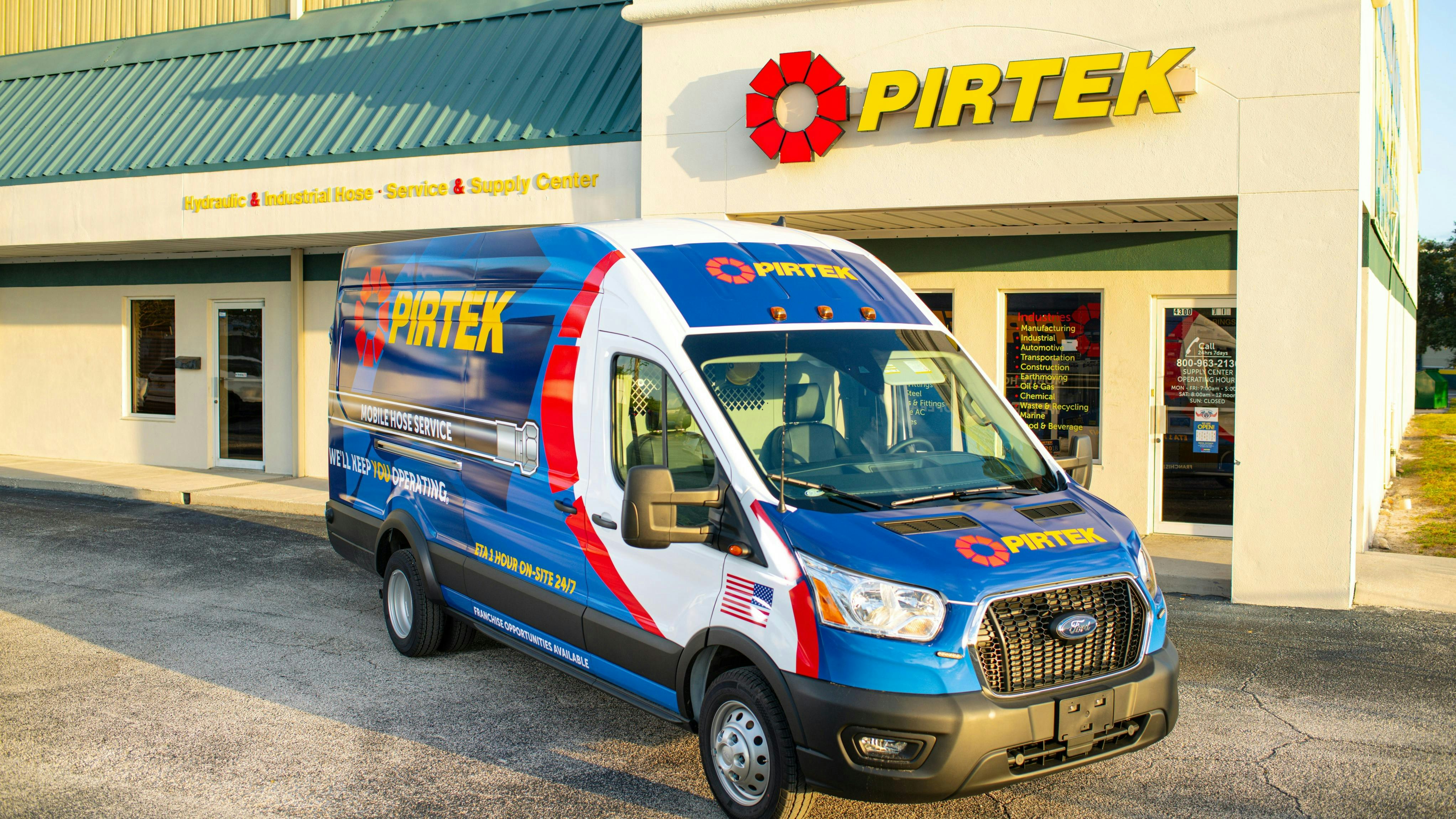 PIRTEK USA Service Van in Front of a PIRTEK Office