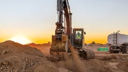 John Deere P-Tier excavator digging in dirt John Deere P-Tier excavator digging in dirt