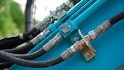 Close up View of Hydraulic Hoses on an Off-Highway Machine Close up View of Hydraulic Hoses on an Off-Highway Machine
