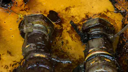 Oil Leak on a Hydraulic Line Oil Leak on a Hydraulic Line