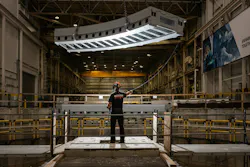 Ingersoll Machine Tools employee guiding movement of an azimuth track Ingersoll Machine Tools employee guiding movement of an azimuth track