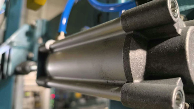Close up on a pneumatic cylinder