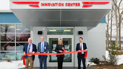 Executives from The Lee Company standing in front of new Innovation Center for ribbon cutting Executives from The Lee Company standing in front of new Innovation Center for ribbon cutting