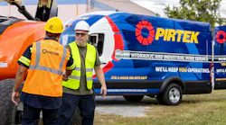 A PIRTEK service provider greeting a customer