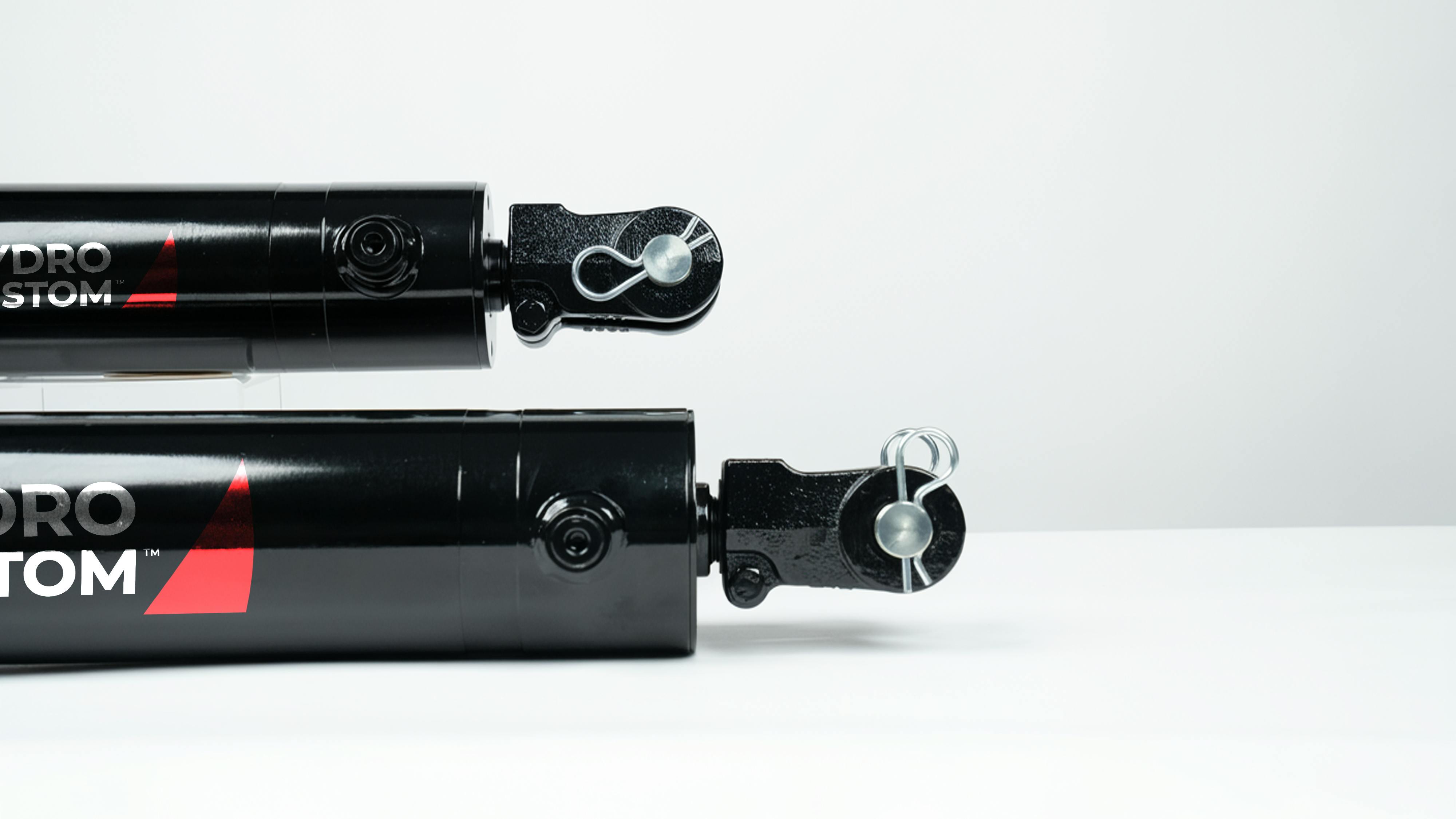 Close up on end of two Bailey Hydro Custom WC Series Cylinders