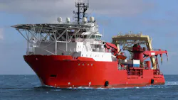 Large ship moving along a waterway Large ship moving along a waterway