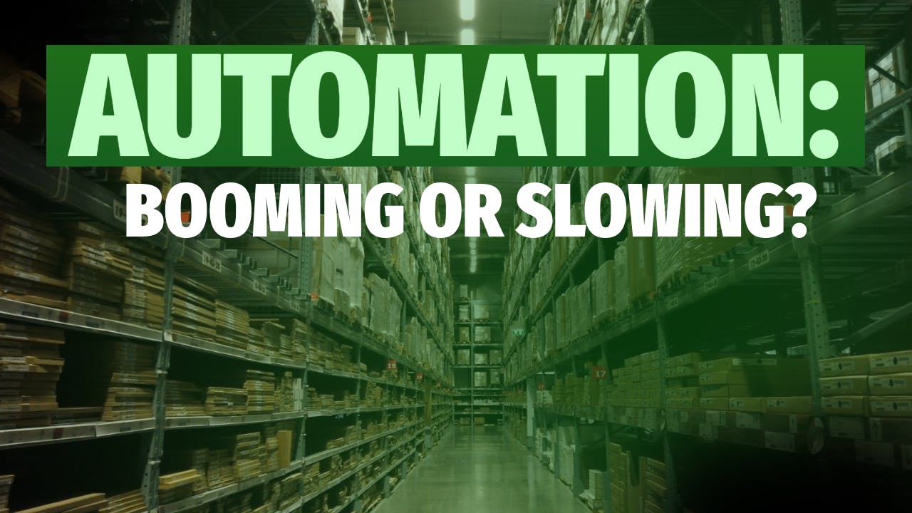 Warehouse in background with text Automation: Booming or Slowing? over it