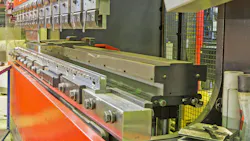 Angled View of a Press Brake in a Manufacturing Operation Angled View of a Press Brake in a Manufacturing Operation