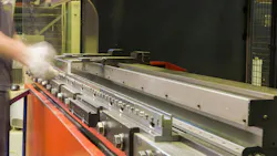 Worker Using a Press Brake Worker Using a Press Brake