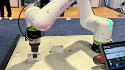 Camozzi Smart Gripper on a cobot being demonstrated at a tradeshow